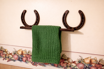 Horseshoe towel rack